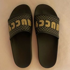 Gently worn Guccy by Gucci slides